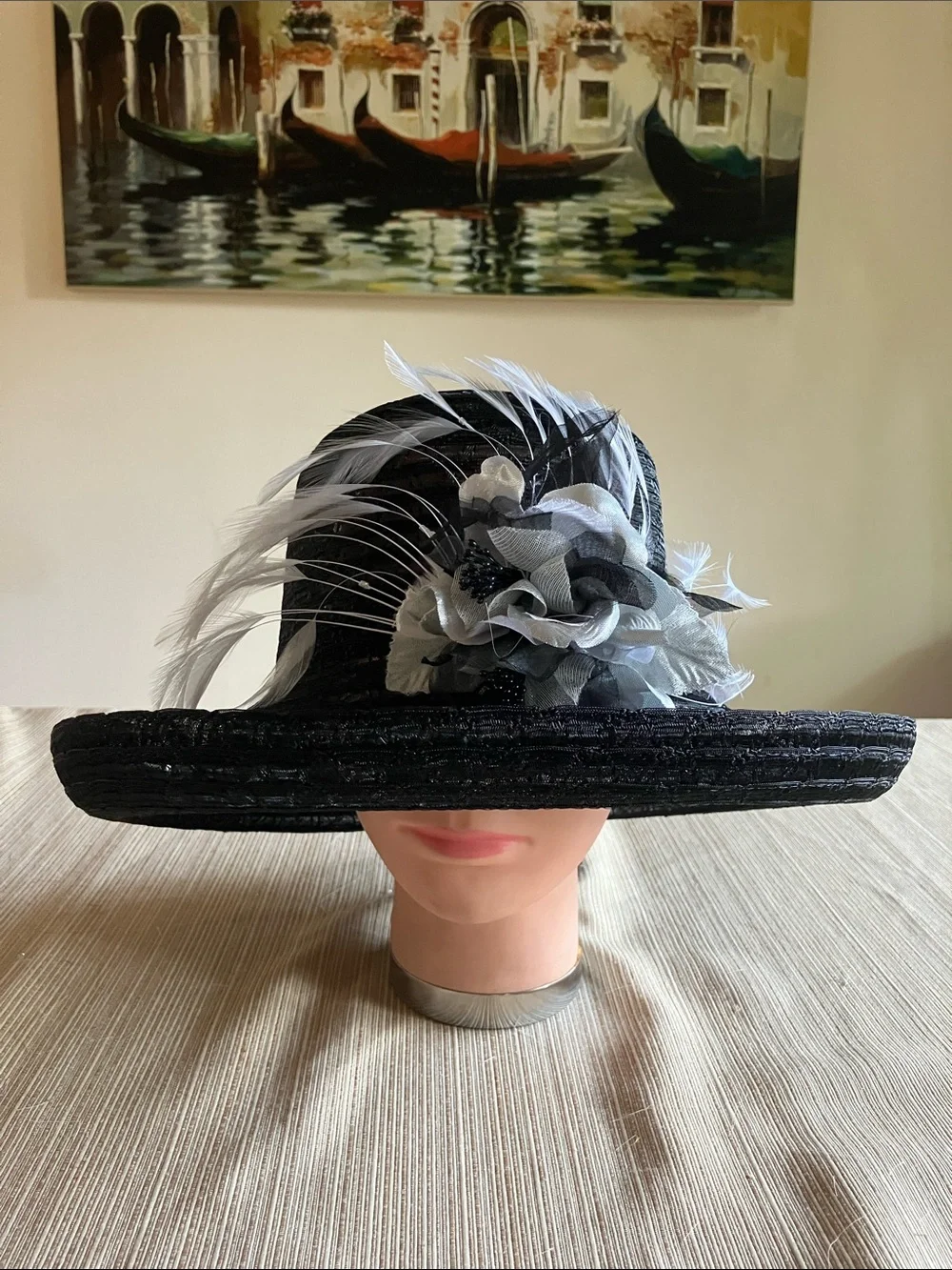 Elegant Black Wide-Brim Hat with Metallic Silver and Black Flower Accent